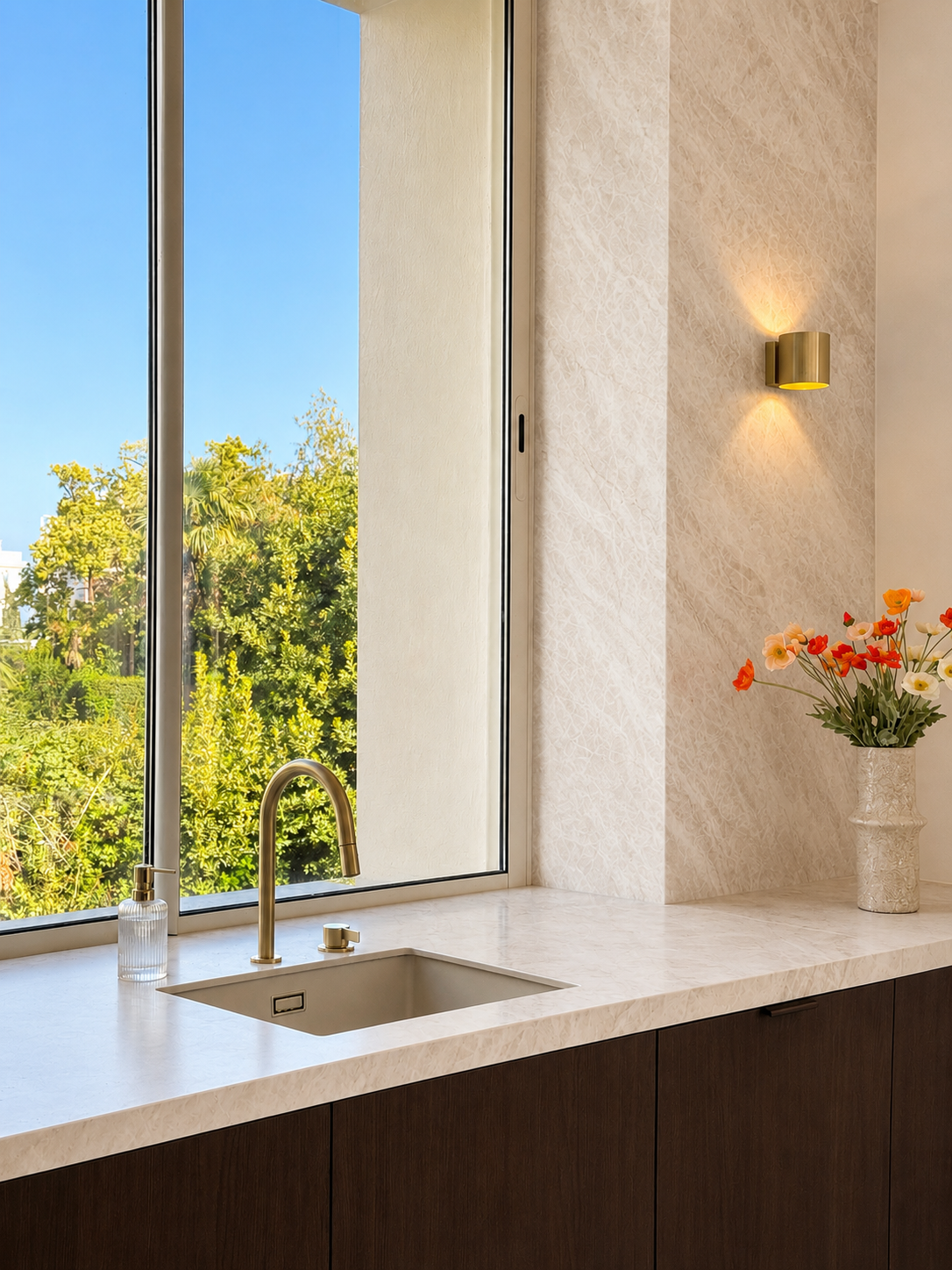 Kitchen detail with integrated appliances and oak millwork